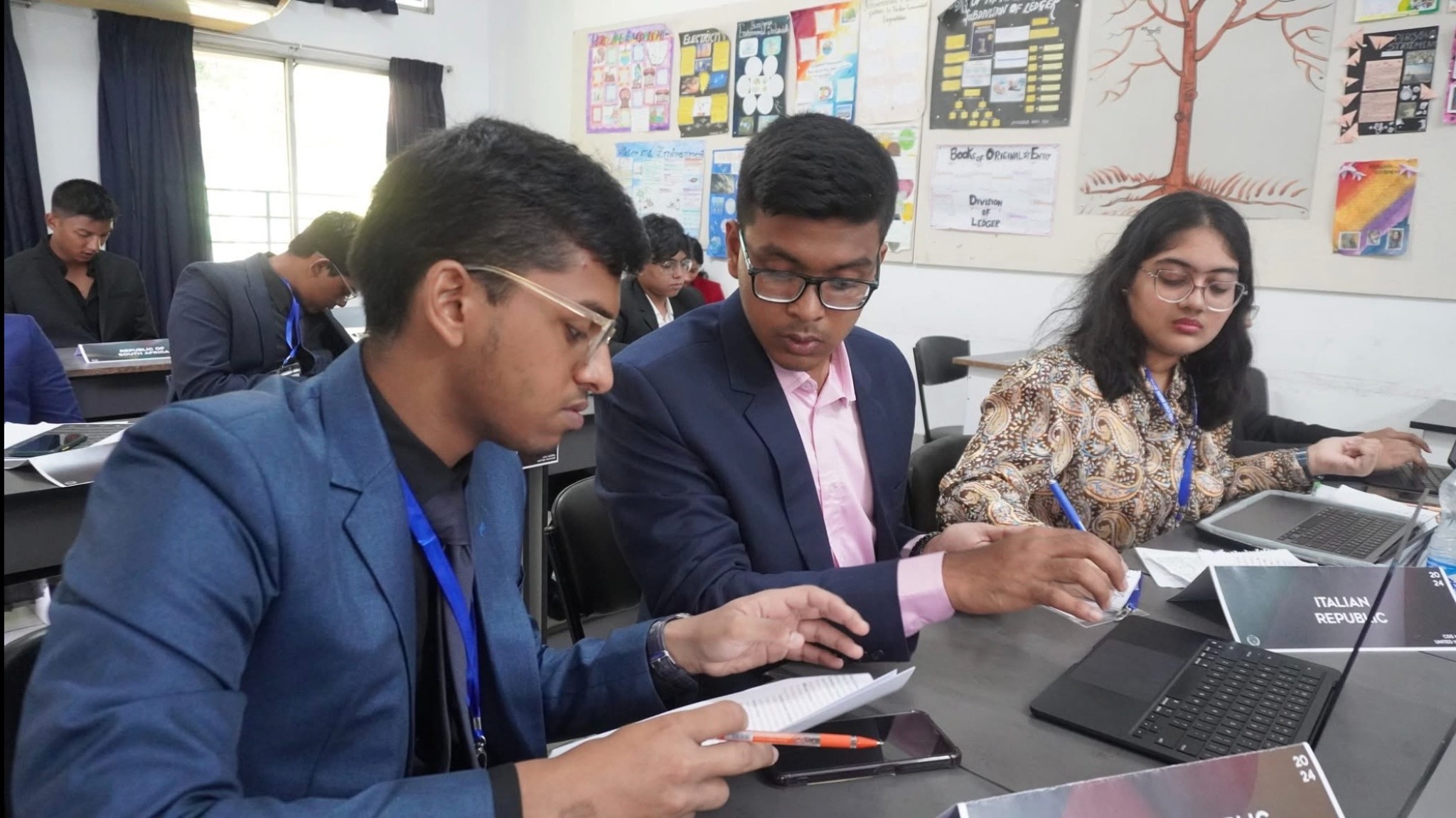 CGSMUN24 delegates working together in committee